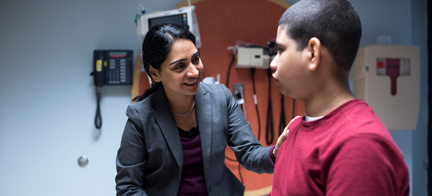 Dr. Preeti Raghavan with a Patient