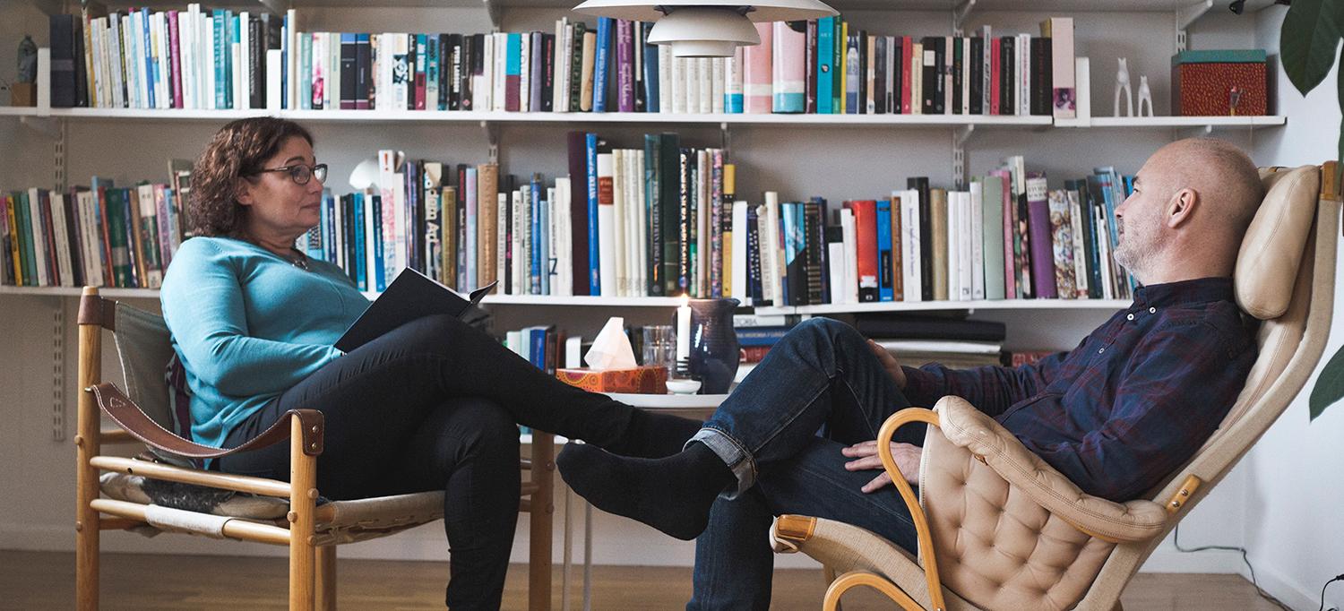 Mental Healthcare Provider Speaks with Patient in Office